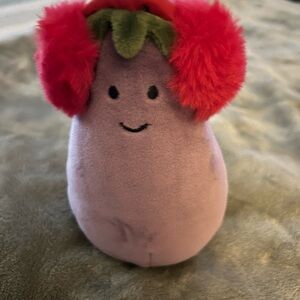 Plush Eggplant Toy with Red Earmuffs